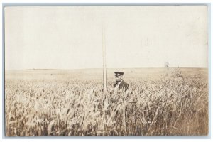 Larimore ND Postcard RPPC Photo Wheat Field Farmer Farming c1910's Antique