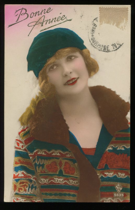 Bonne Annee. Happy New Year. 1924 hand colored RPPC. Woman in coat and green hat