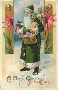 c1915 Embossed Christmas Postcard Santa Claus in Green Robe w/ Presents, posted