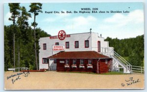 RAPID CITY, SD South Dakota ~ Roadside WHEEL INN RESTAURANT  1957 Postcard