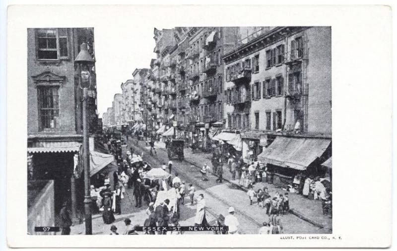 New York NY Busy Scene on Essex Street Store Fronts Horse & Wagons Postcard