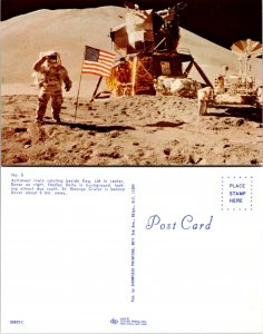 Astroneut Irwin saluting beside flag, LM in center, Rover on right. (10076)