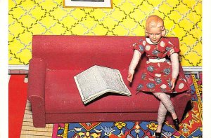 Woman Red Couch Newspaper, By Laurie Simmons  