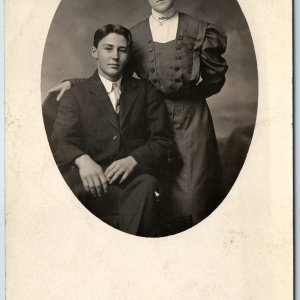 c1910s Lovely Young Lady & Man RPPC Portrait Pompadour Corset Classy Smirks A212