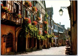 VINTAGE POSTCARD CONTINENTAL SIZE THE FLOWERED VILLAS OF RIQUEWIHR ALSACE FRANCE