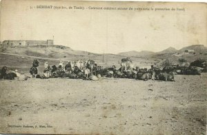 CPA AK TUNISIE DEHIBAT Caravane campant antour du poits la protection (174689)