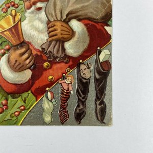 c.1915 Old Santa Claus Bell Toys Sack Bag Stockings Embossed Christmas Postcard