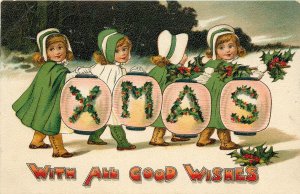 Christmas Postcard Children Hold Lanterns Spelling Out XMAS Girls in Green 274
