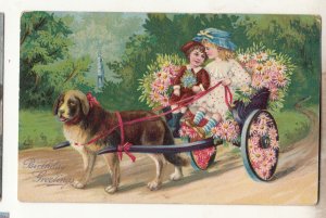 P3301 JL old npostcard 2 young girls riding flower cart with dog colorful