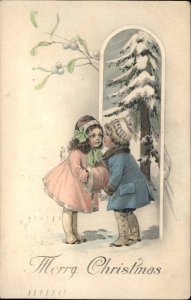 Christmas Little Boy and Girl Kiss Under Mistletoe c1910 Vintage Postcard