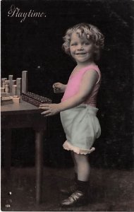 Young child with a xylophone Playtime Child, People Photo Unused light oxidation