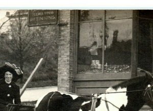 Postcard Horse Carriage,Sewer Piping & Tinning Storefront - Manistee MI? RPPC N5