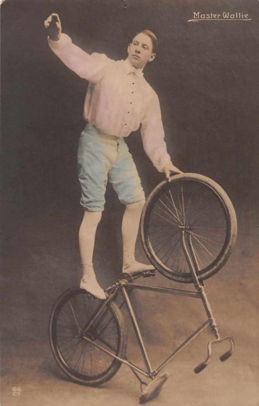 Master Wallie Man on Bicycle Tinted Real Photo Antique Postcard J79433