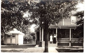 Real Photo, Woman and Girl on Steps of House, 1907-1929