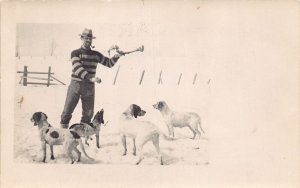 J72/ Interesting RPPC Postcard c1910 Man Feeding Dogs Pets Snow 423