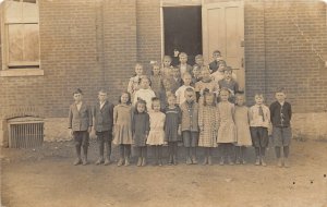 H82/ Interesting Teacher RPPC Postcard c1910 Early School Students 94