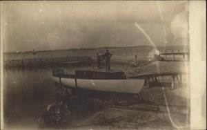 Lighthouse Unidentified Man & Boat Long Island NY Written on Back c1910 RPPC