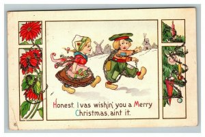 Vintage 1910's Christmas Postcard Cute Dutch Children Glitter Poinsettias Trees