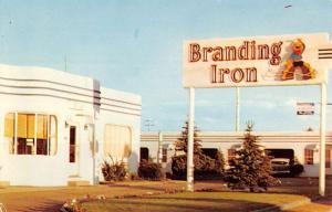 Laramie Wyoming Branding Iron Auto Lodge Street View Vintage Postcard K50771