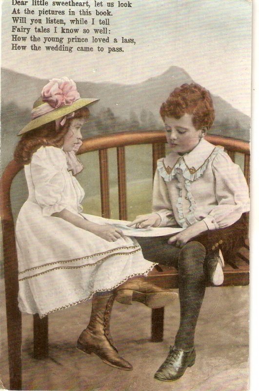 Boy and girl reading a book Nice old vintage English postcard