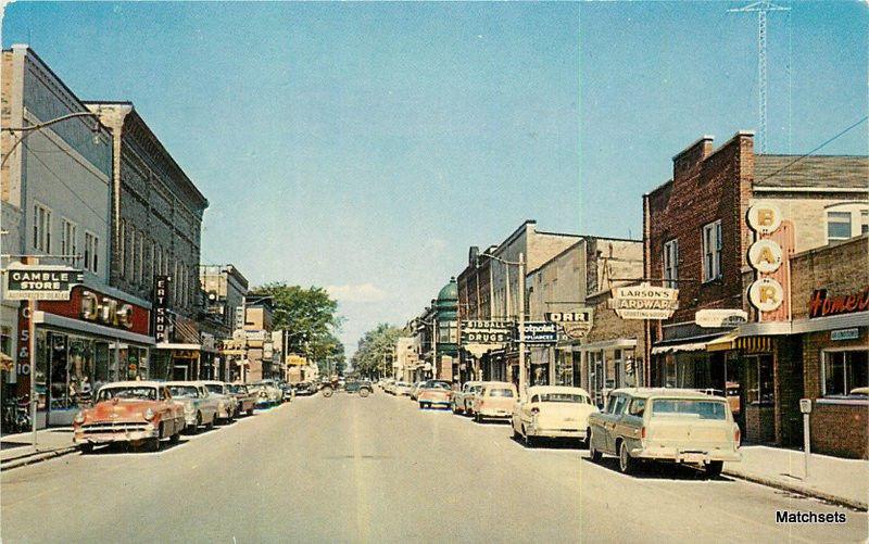 1950's Automobiles Street Scene MANISTIQUE MI L.L. COOK CO postcard 8236