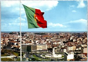 VINTAGE CONTINENTAL SIZE POSTCARD PANORAMIC VIEW OF LISBON AND FLAG PORTUGAL