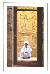 MIN0507 egypt asswan edfu temple guard arab in folkloric costumes hieroglyphs