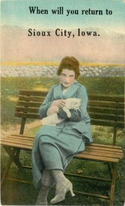 Postcard Woman Holds White Cat on Park Bench Will You Return to Sioux City IA