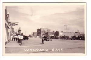 Real Photo, Main, Chevrolet and Mobiloil Signs, Bicycle, Wynyard, Saskatchewan