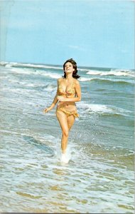 Yellow Bikini Girl running in ocean Postcard Pinup