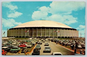 Houston Texas~Astrodome Sports Stadium~Parking Area~Cars~Flags~1950s Postcard