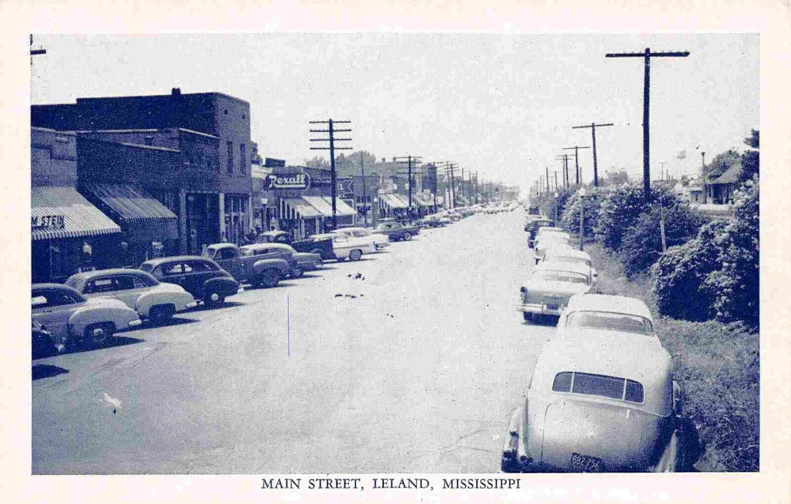 REAL PHOTO BROOKHAVEN MISSISSIPPI DRUG STORE ADVERTISING POSTCARD COPY CARS