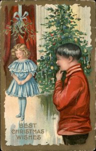 Christmas Boy Ponders Kiss Mistletoe Embossed c1900-20s Vintage Postcard