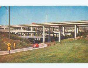 1960's VINTAGE RED VAN OR AMBULANCE AT UNDERPASS Los Angeles California CA d4411