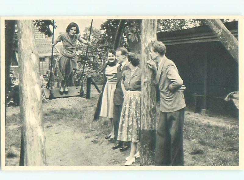 foreign Old Postcard EUROPEAN WOMAN STANDING ON SWING AC2223