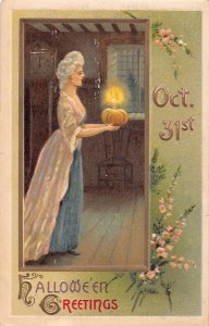 J87/ Halloween Postcard Holiday c1910 2471 Woman Candle Pumpkin 75