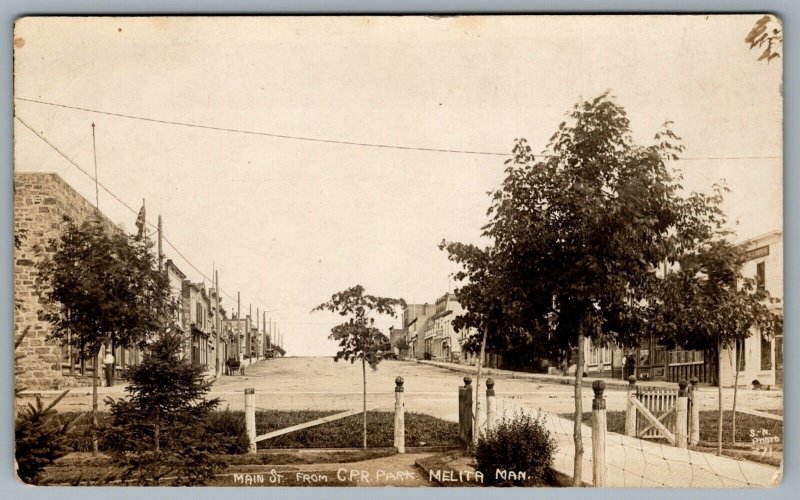 Postcard RPPC c1910s Melita Manitoba Main Street From C.P.R. Park S. N. Photo