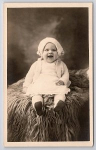 RPPC Adorable Baby Big Smile On Sheep Fur Throw Chicago Zima Studio Postcard J38