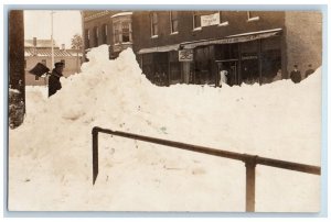 c1900's Snowstorm Grocery Hardware Store Theater Wisconsin RPPC Photo Postcard