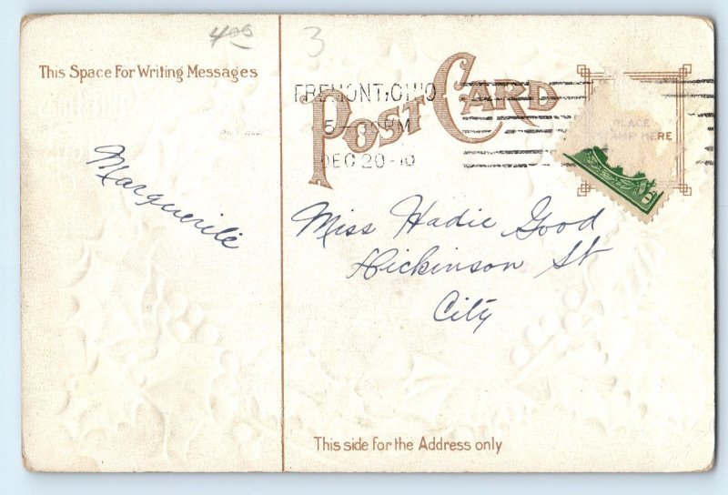 c1910's Christmas Children Sledding Winter Scene Holly Berries Embossed Postcard