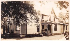VICTORIAN HOUSE WITH ORNATE TRIM~PORCHES REAL PHOTO POSTCARD 1900s