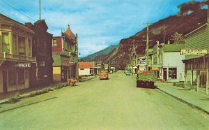 Skagway AK  Main Street Storefronts Old Trucks, Postcard