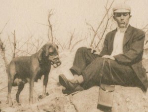 RPPC 2 Men, 1 w/Cigarette Holder, Camera, Derby~Female Black Lab w/Muzzle c1916