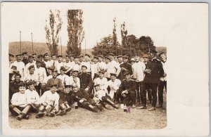 German WWI Soldiers Large Regiment Group Photo RPPC Uniforms Field Camp Postcard