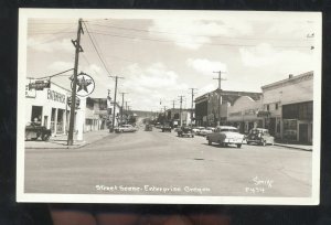 RPPC ENTERPRISE OREGON DOWNTOWN STREET SCENE OLD CARS REAL PHOTO POSTCARD