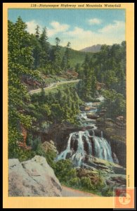 Picturesque Highway and Mountain Waterfall