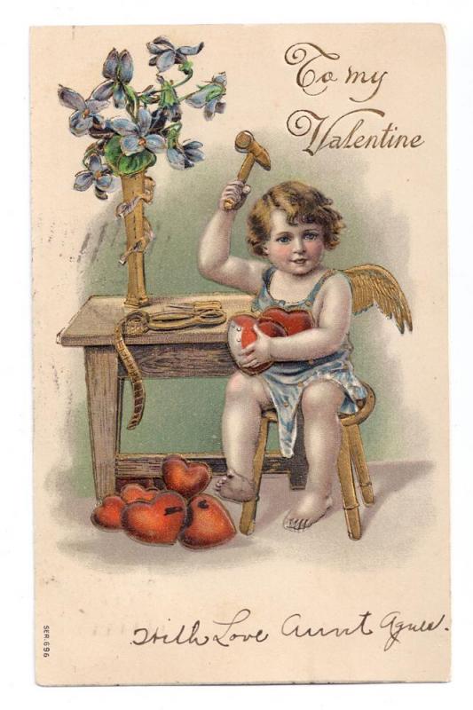 Valentine Cupid with Hammer Hearts Embossed Gilded 1908