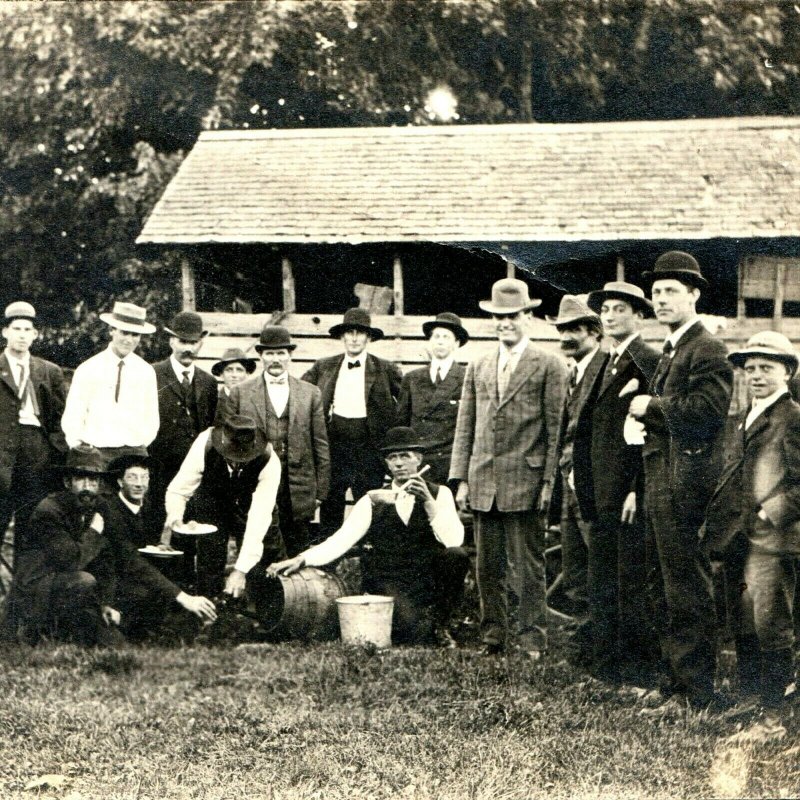 1910s Group Men Suits Eating Outdoors Wine Barrel Real Photo Postcard RPPC A2