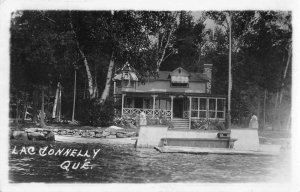 Lac Donnelly Quebec Canada Cottage and Boat Dock Real Photo Postcard AA48987