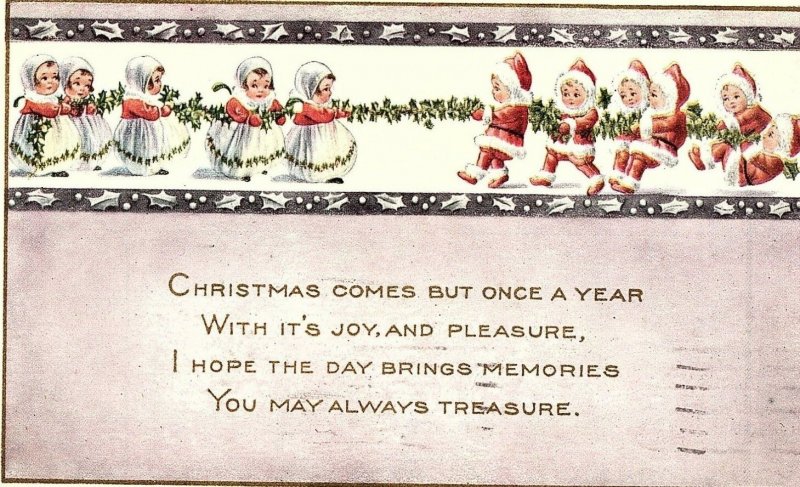 C.1910 Adorable Children as Santa & Mrs Claus Tug-o-War Victorian Postcard F36